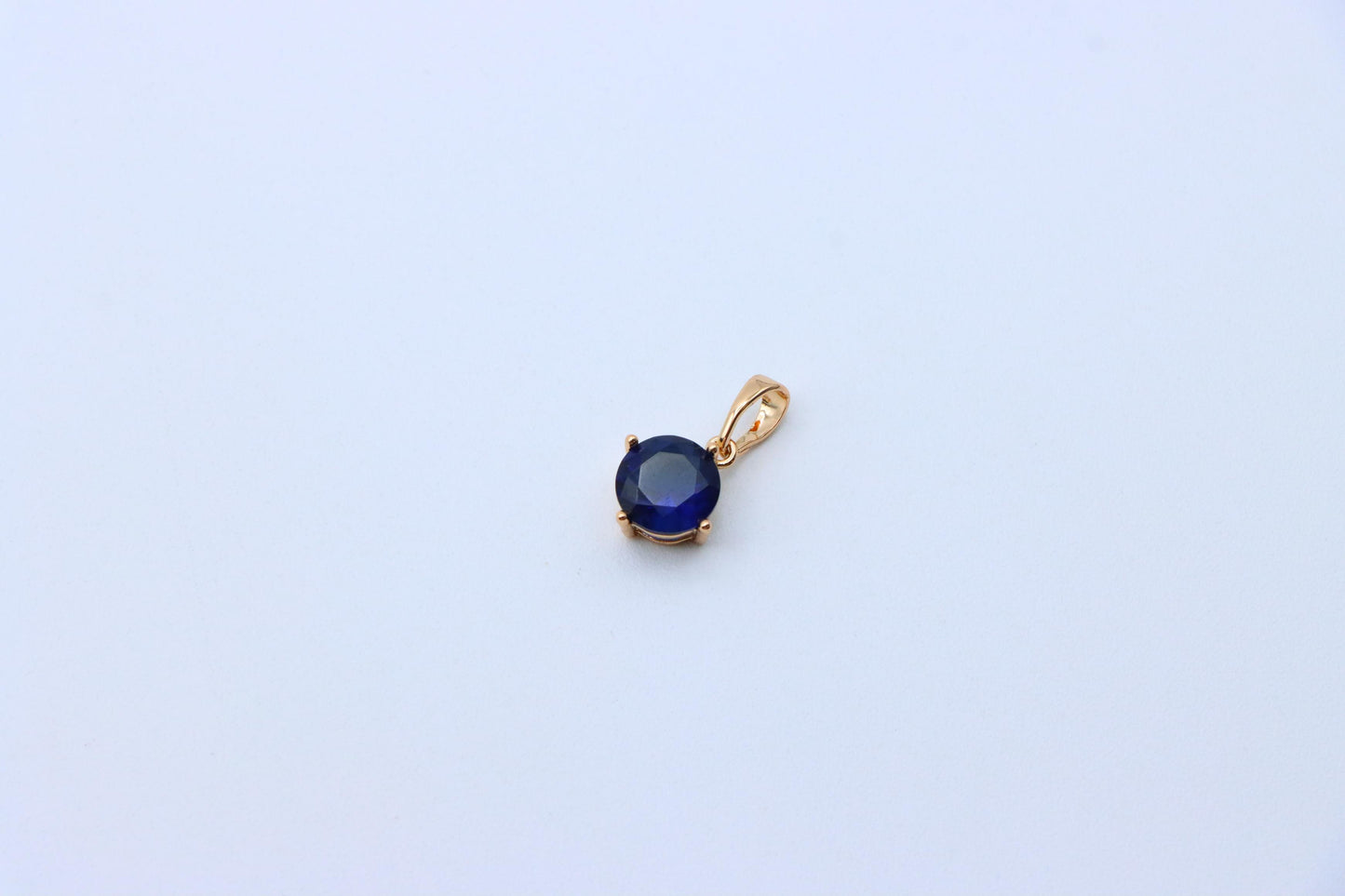 Elegant Round Blue Stone Pendant in Rose Gold Finish, XPPT1558 (2143-10)