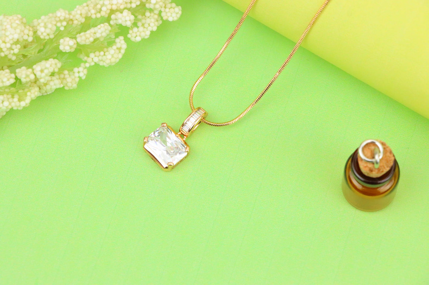 Elegant White Stone Pendant in Gold Finish with Baguette Detailing, XPPT1777 (2162-7)