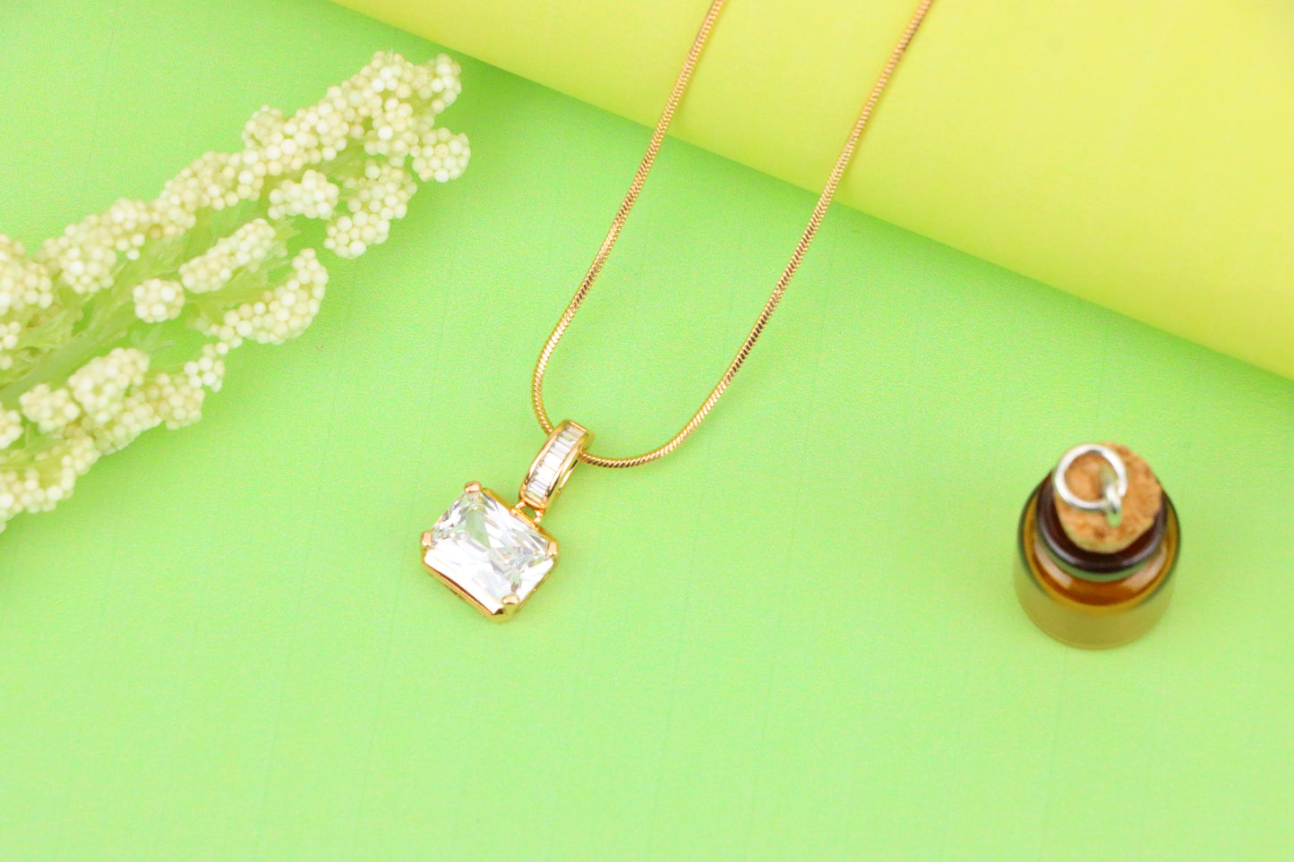 Elegant White Stone Pendant in Gold Finish with Baguette Detailing, XPPT1777 (2162-7)