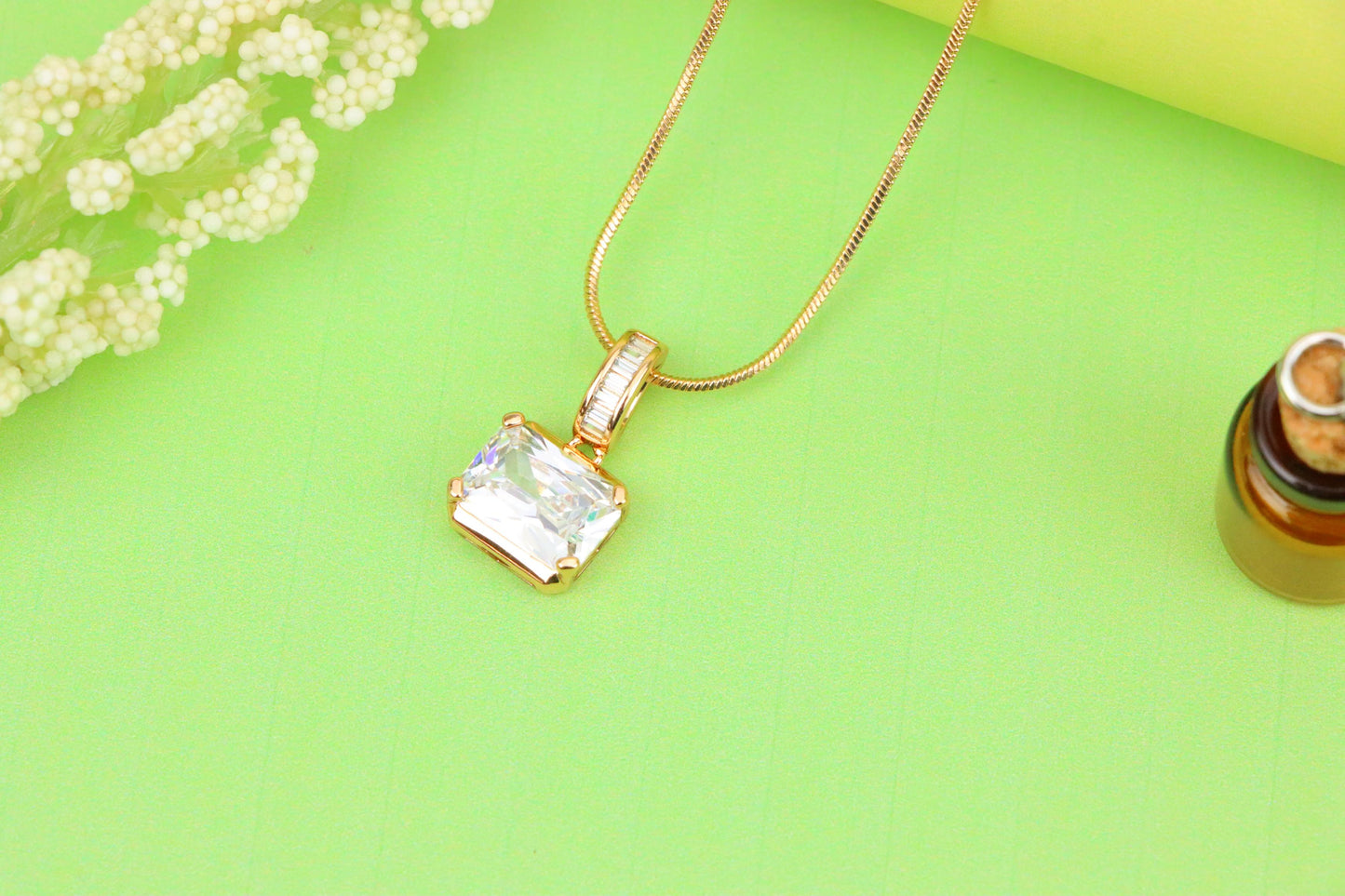 Elegant White Stone Pendant in Gold Finish with Baguette Detailing, XPPT1777 (2162-7)