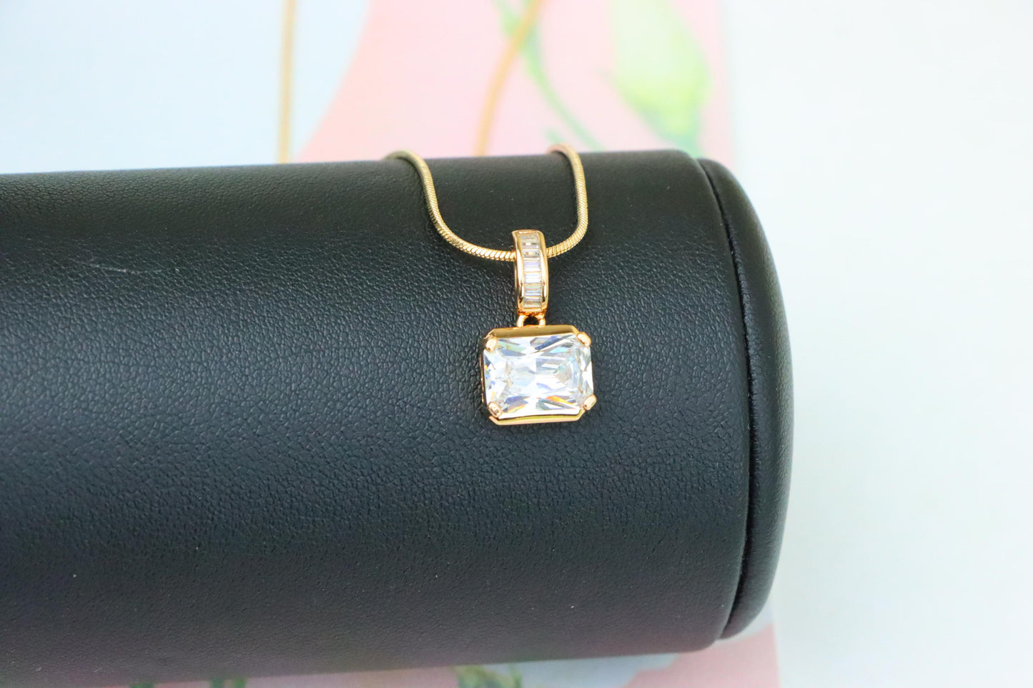 Elegant White Stone Pendant in Gold Finish with Baguette Detailing, XPPT1777 (2162-7)