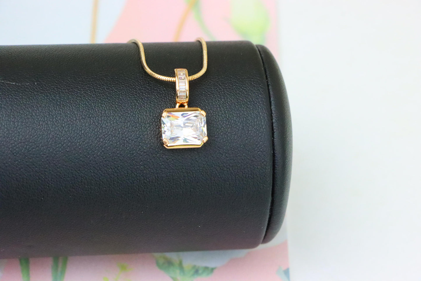 Elegant White Stone Pendant in Gold Finish with Baguette Detailing, XPPT1777 (2162-7)