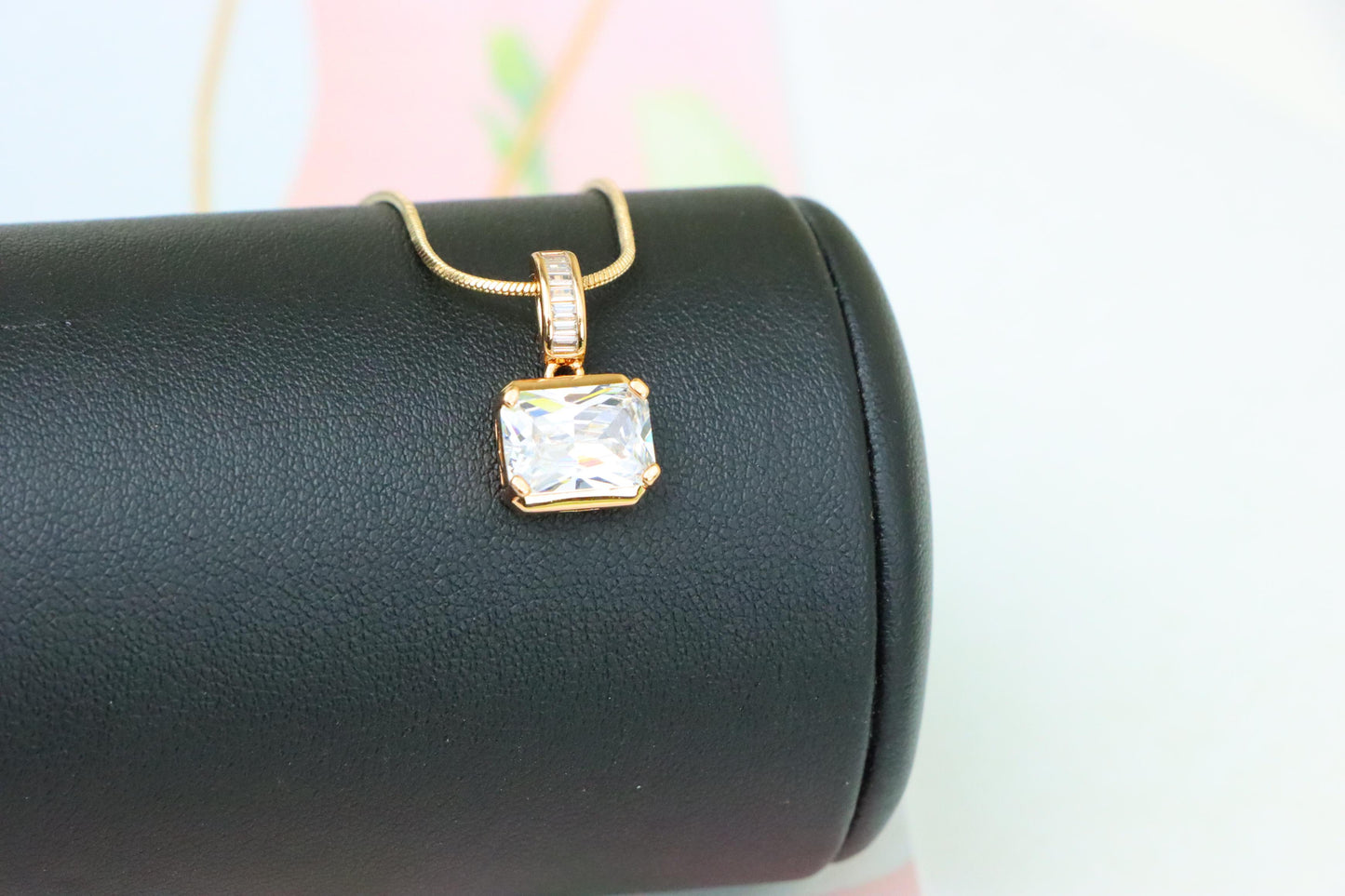 Elegant White Stone Pendant in Gold Finish with Baguette Detailing, XPPT1777 (2162-7)