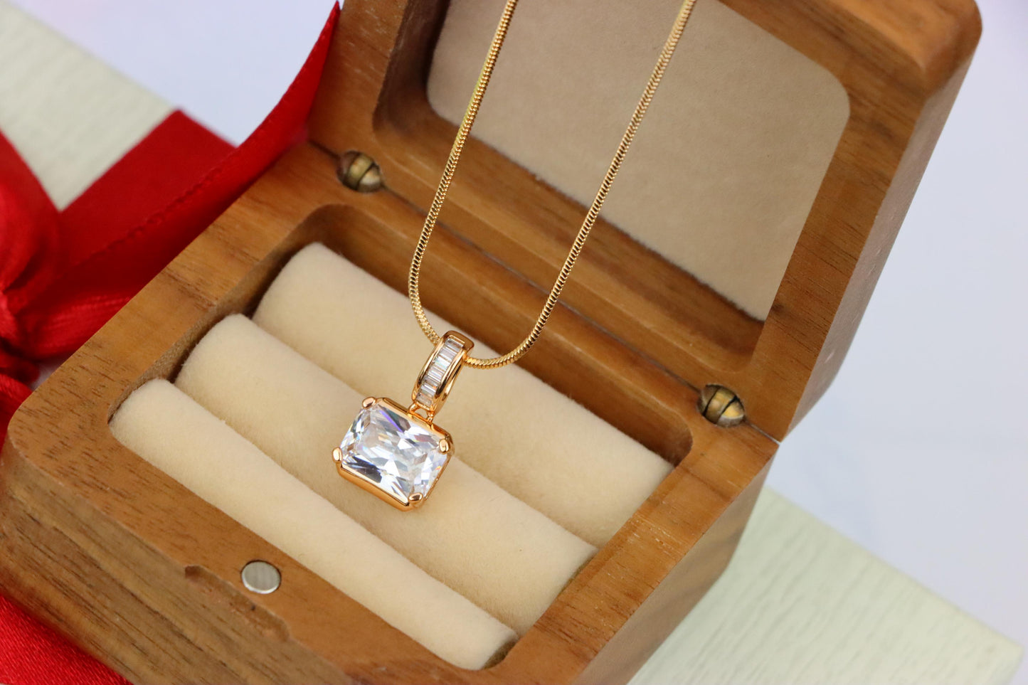 Elegant White Stone Pendant in Gold Finish with Baguette Detailing, XPPT1777 (2162-7)
