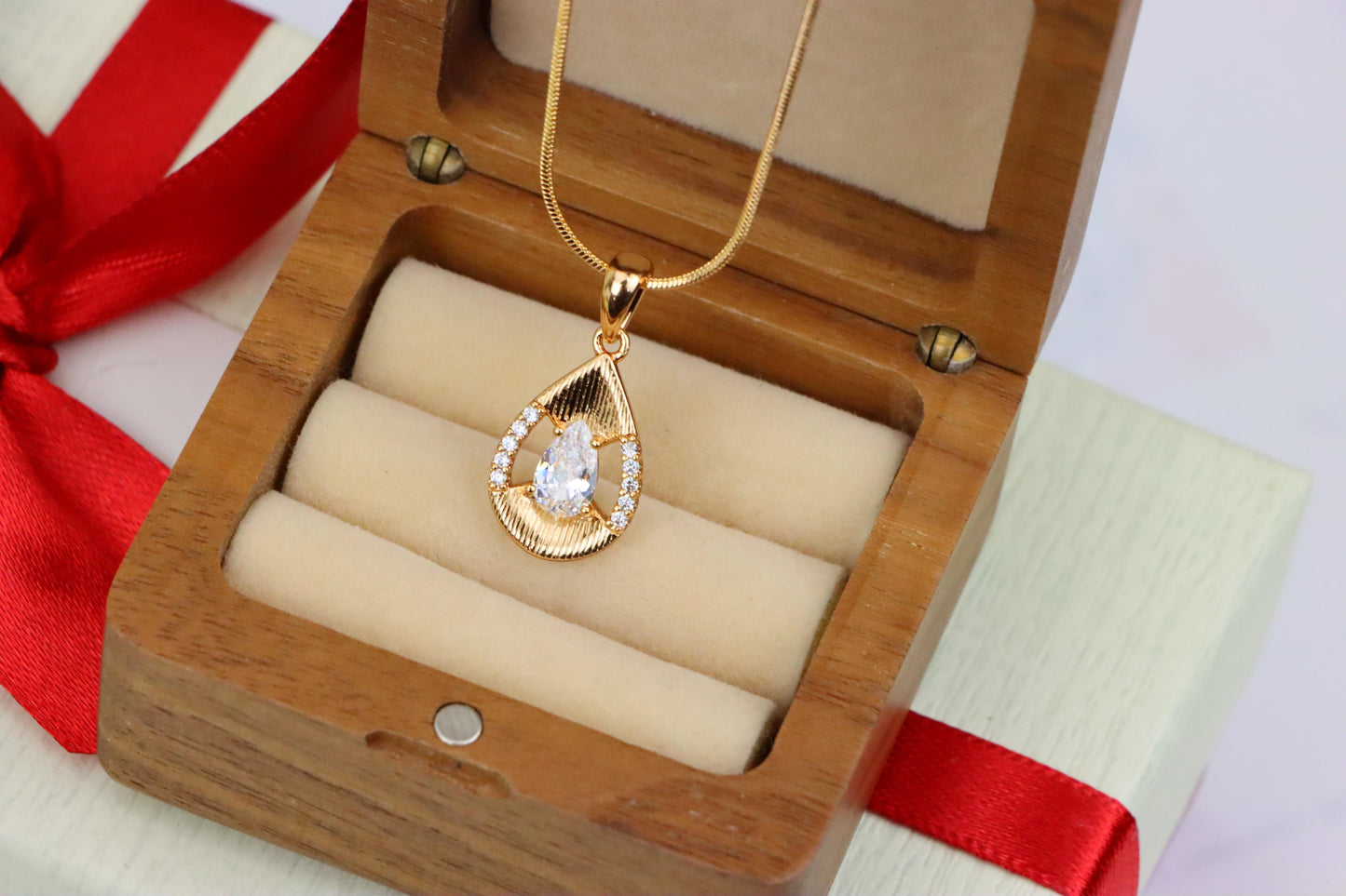Elegant Teardrop Pendant with White Gemstone and Gold Finish, XPPT1687 (2164-4)