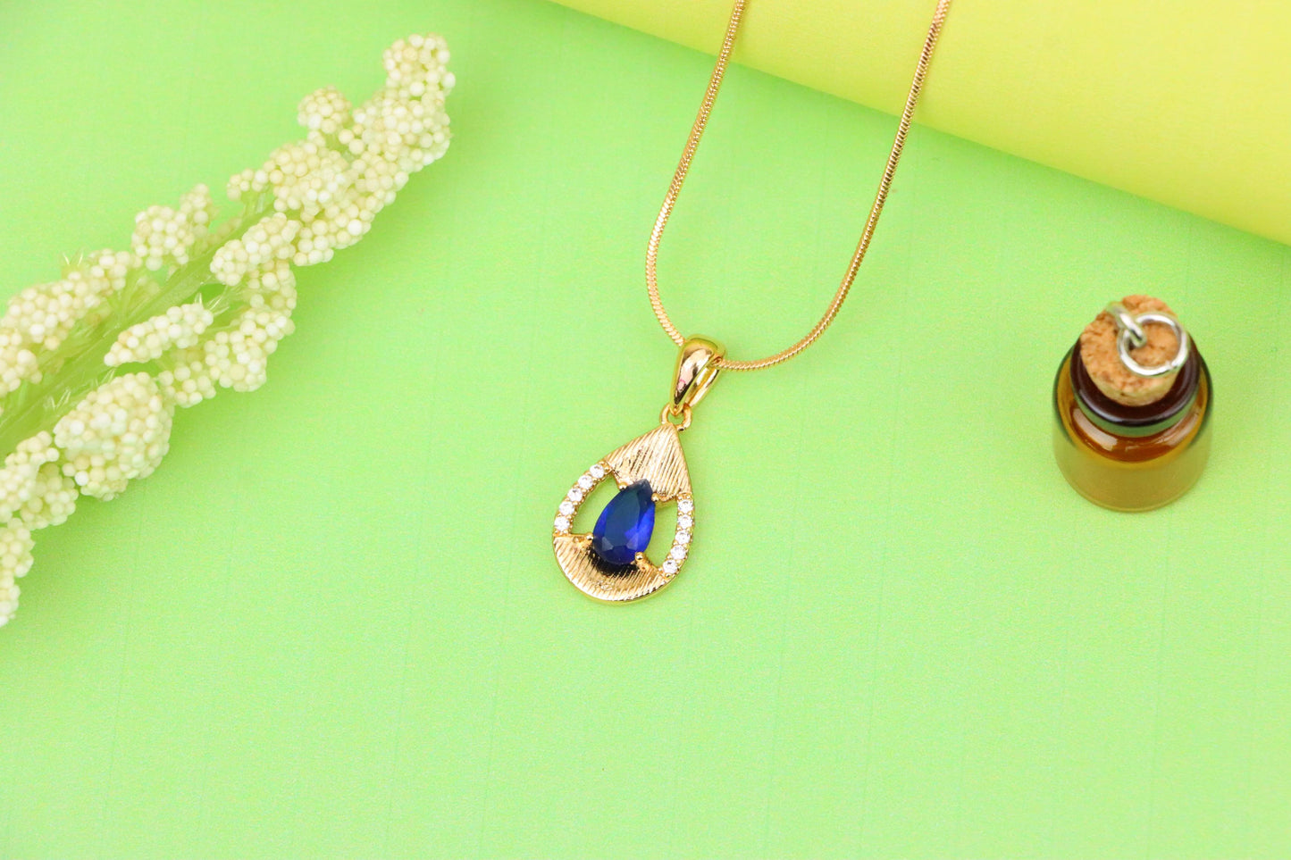 Elegant Blue Teardrop Pendant with Sparkling Accents and Gold Finish, XPPT1688 (2164-4)